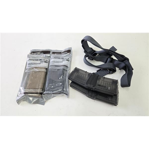 2 new in package Magpul mag 30 AR/M4 5.56 Nato and 4 AR 15 pistol mags plus a rifle sling