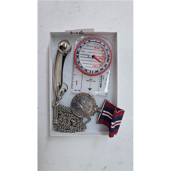 Canadian WW2 sterling service medal dated 1939-1945, a call whistle, and a compass