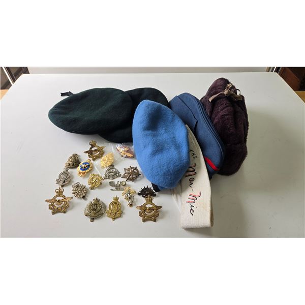 Selection of military caps and cap badges