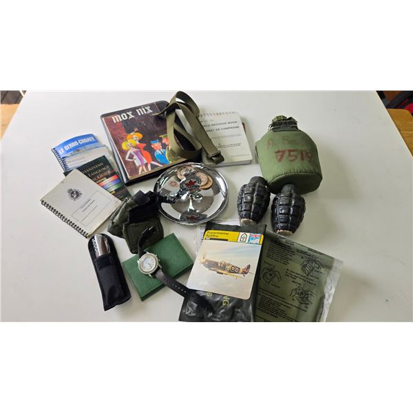Selection of Canadian military collectibles including belt buckle, military language manuals, pocket
