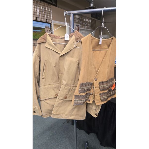 2 vintage pieces of hunting clothing including a canvas large mens jacket with inner and outer pocke