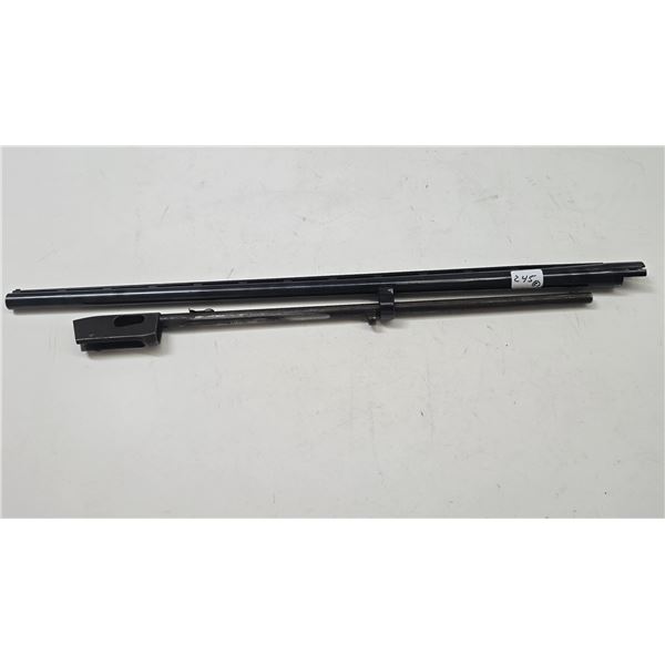 2 Remington rifle barrels including 12ga 2-3/4" shells and a .22cal rifle barrel