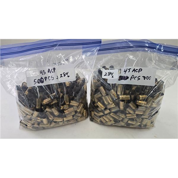 2 bags containing 1200 .45 ACP brass