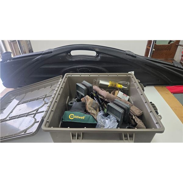 Selection of shooting supplies including gun vise, gun rests, rifle sling, ammo belt and pouch all i