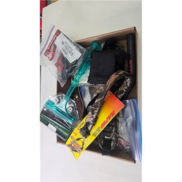 Selection of gun smalls including quick detach swivels, slings, trigger locks, support bullet remove