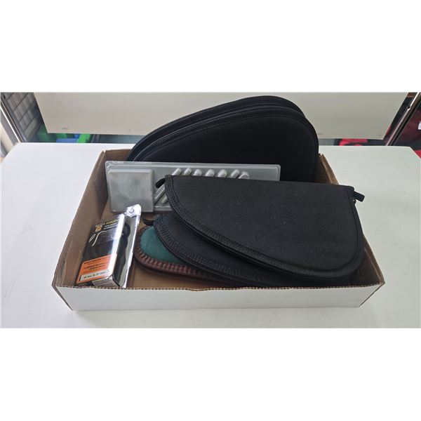 5 soft pistol cases, a pistol cleaning kit, and snake