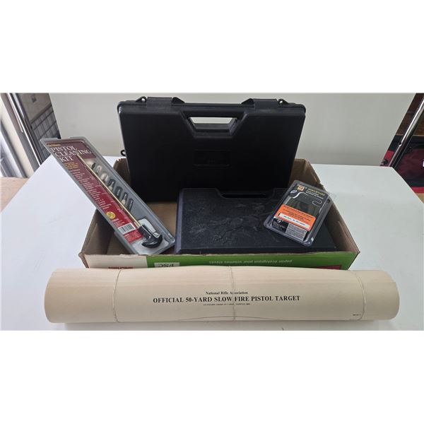 2 hard pistol cases, a pistol cleaning kit, and snake