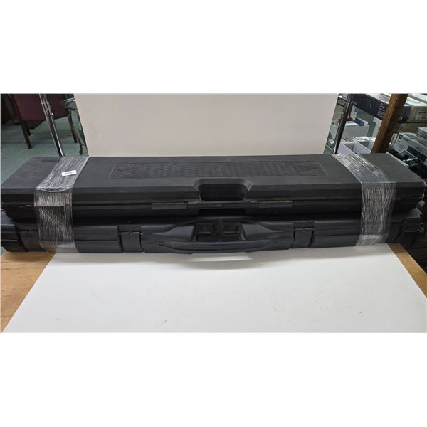 2 Foam lined hard gun cases including a possible 2 gun and a single gun