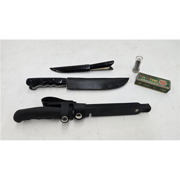 The Fishermans Solution multi knife and 2 eastern european knives plus a sharpening stone and a ream