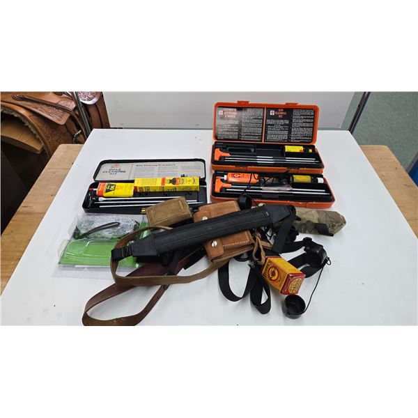 Three vintage cleaning kits (two appear complete), leather and webbed rifle slings, leather ammo pou