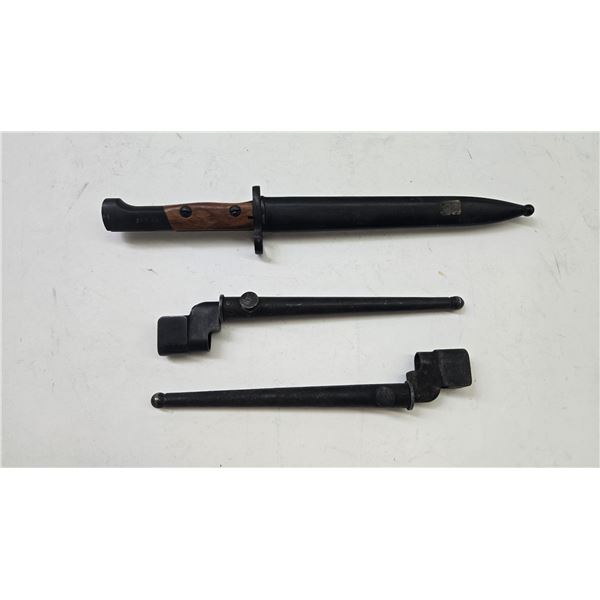 Three bayonets including two Enfield spikes and a mouser bayonet