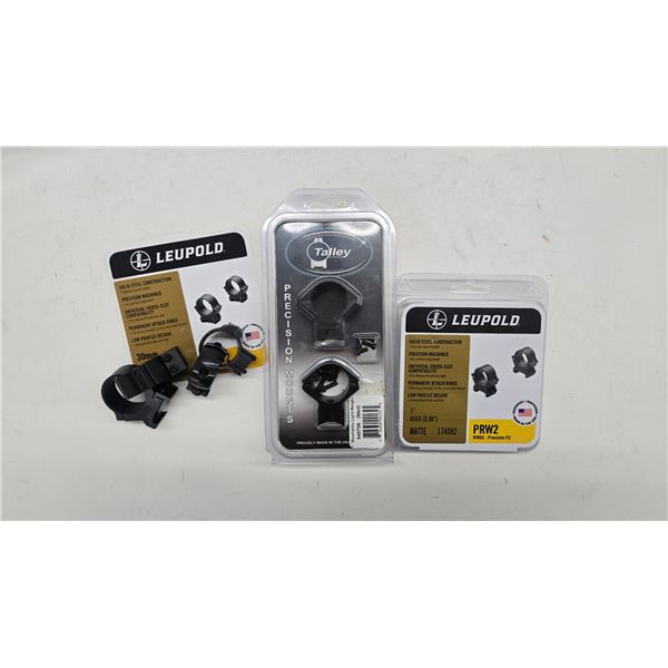 Four sets of scope rings including 2 Leupold PRW2, a set of Talley 1" and an unmarked set