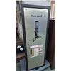 Image 1 : Honeywell executive digital safe measuring 59" H x 21" W x 16" D. Comes w/ 3 shelves, 14 gun holder,