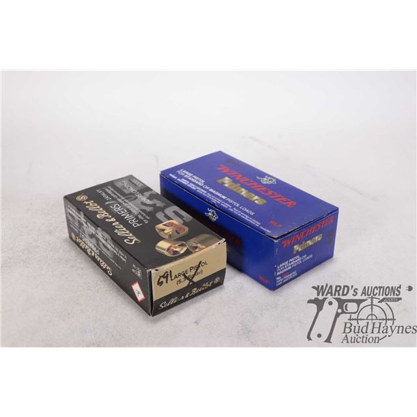One partial 800 count box Winchester large rifle primers and a 591 count box of Sellier & Bellot lar