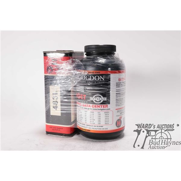2 partial 1lb containers of Hodgdon rifle powder including vintage 4831 and a target. Total weight 1