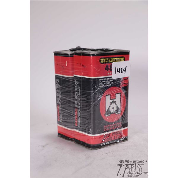 One full vintage and one partial container of Hodgdon 4831. Total weight 790 g