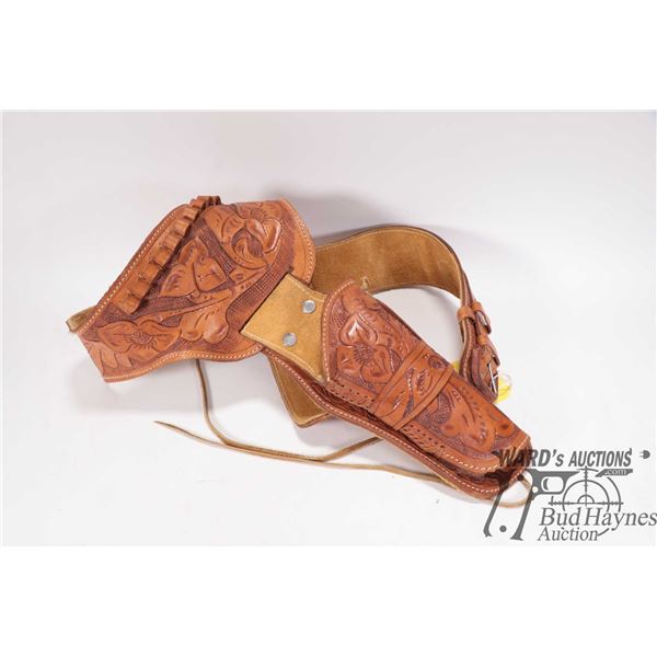 Modern hand tooled leather gun belt, total belt length 46 1/2". Fitted with cartridge loops, appear 