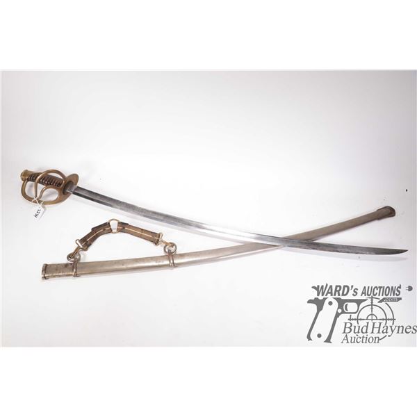 Ames model 1840 enlisted cavalry saber with metal sheath, dated 1865. Marked "US" over "A.D.K" on ri