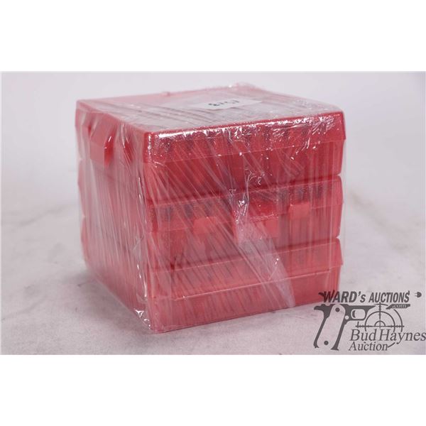 Three full 100 count ammo boxes with 9mm reloads