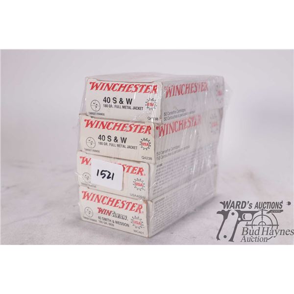Three full 50 count and a partial 25 count box of 40 S&W reloads