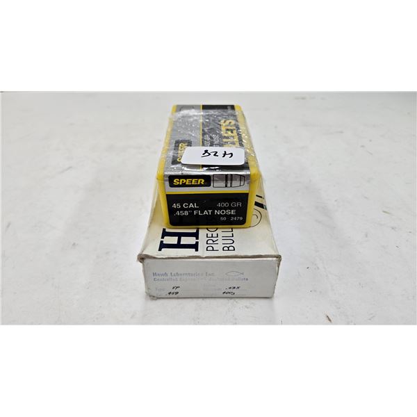 One full 100 count box of Speer 45 cal, 400 gr. Flat nose bullets and a 34 count box of hawk control