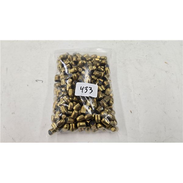 Bag containing 250 brass coated .40 cal bullets