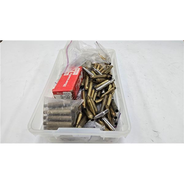Lot containing mixture of 257 cal, 7mm, 30 cal etc. bullets, all appears to rifles and brass
