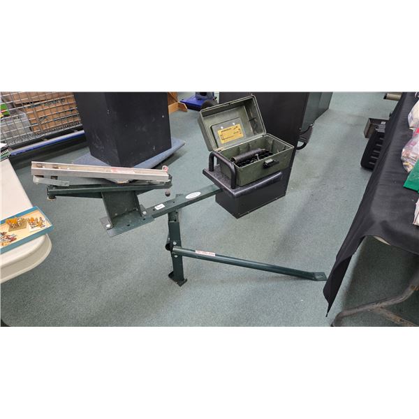 Trius Trapmaster target thrower and a shot shell ammo. case