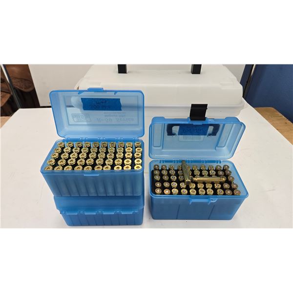 Ammo box with one hundred 300 Win Mag brass