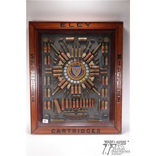 Antique Eley ammunition display of shot shells, rifle ammo and hand gun ammo, in shadowbox display i