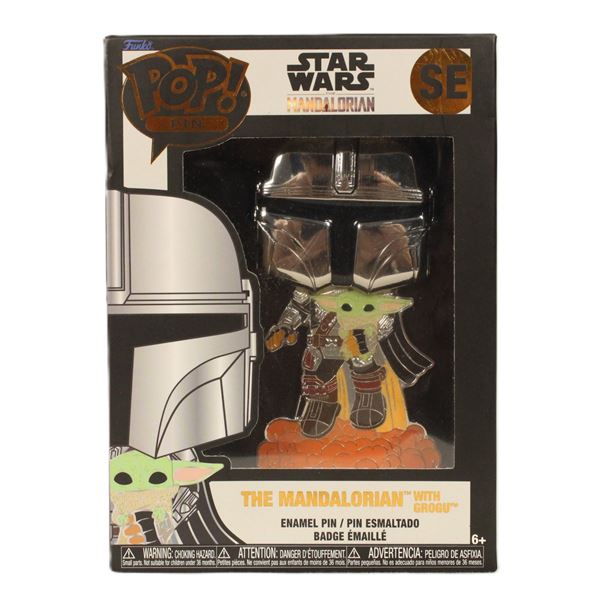 A large Funko Pop Pin The Madalorian with Grogu Special Edition Enamel Pin.