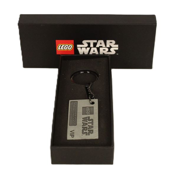 A New-In-Box Lego Star Wars VIP The Mandolorian Beskar Keychain.