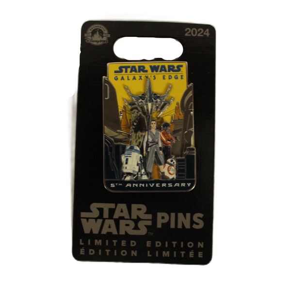 A Star Wars Galaxy's Edge Limited Edition 5th Anniversary Pin.