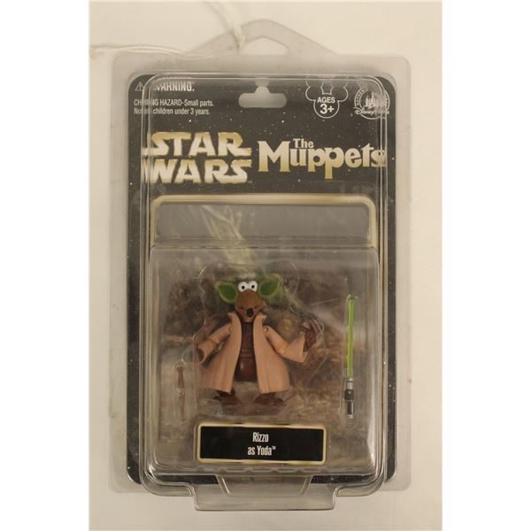 A Star Wars The Muppets Rizzo Action Figure.