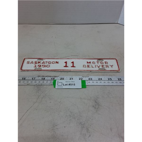 Metal "1990 Saskatoon #11 Motor Delivery" License Plate