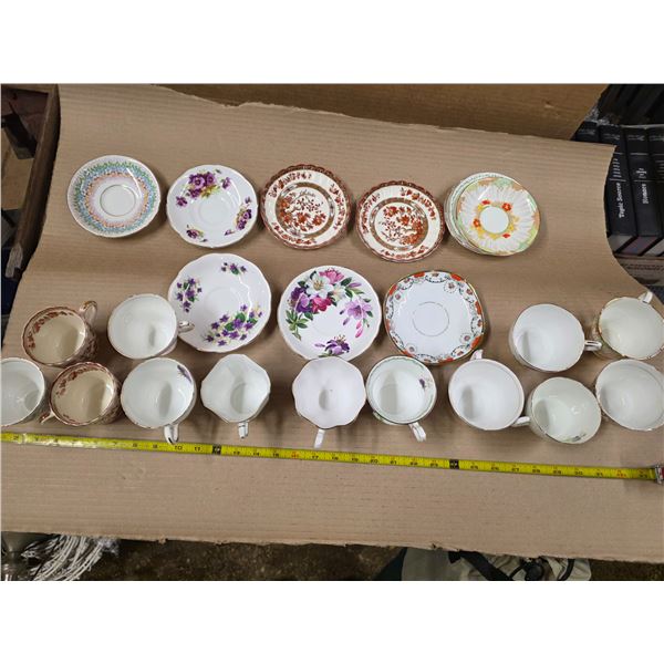 Variety of different chinaware- tea cups and saucers