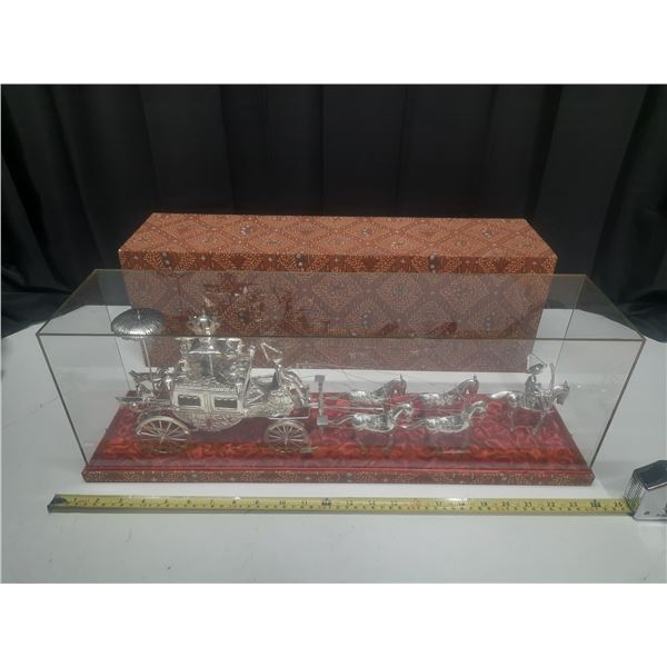 Silver chariot with driver and horses. The item comes in a protective case. The item is hand crafted