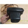 Image 6 : Vintage film camera kit, including a camera body with a lens attached.