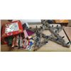 Image 1 : Collection of Christmas decorations and wrapping supplies, including a large, star-shaped tinsel lig