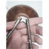 Image 5 : Vintage walnut wood salad bowl set with a metal wire stand, accompanying nutcrackers, and serving pi