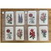 Image 1 : 8 Antique Tobacco Silks Featuring Flower Design.