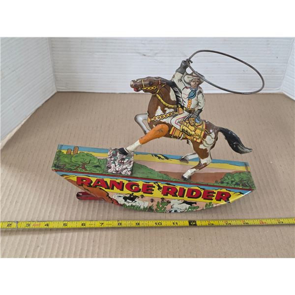 Vintage range rider tin wind up toy- 12"L