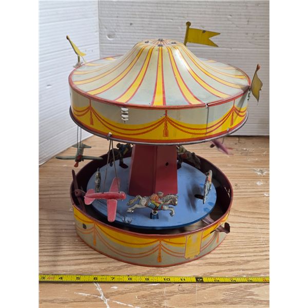 vintage tin lever action merry go round- works- 12" by 12"H