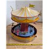 Image 1 : vintage tin lever action merry go round- works- 12" by 12"H