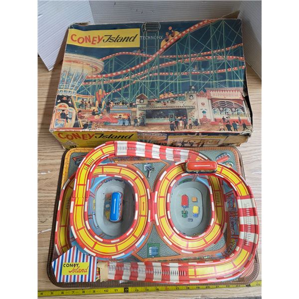 Coney island car race track-21"L with original box and wind up cars- has 1 key