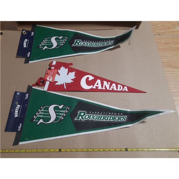 (2) Vintage-style Saskatchewan Roughriders felt pennants and Canada.