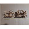 Image 3 : Vintage miniature rattan rocking chairs and small rattan furniture pieces, often used as decorative 