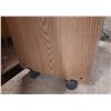 Image 4 : This item is likely an oak-finished microwave cart or small entertainment stand with wheels on botto