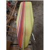 Image 4 : Vintage folding ironing board with a striped cover (Height 35"), positioned in front of a wooden dry