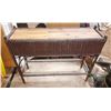 Image 1 : Vintage wicker planter box likely features a metal liner and is constructed in a style popular durin